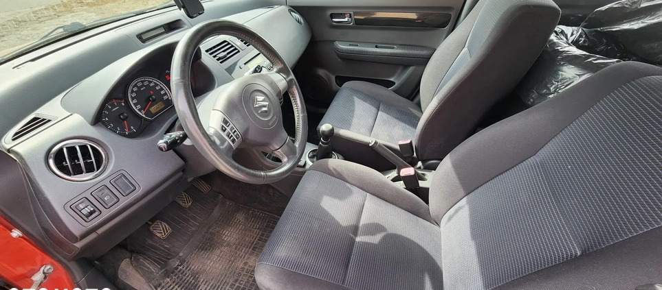 Suzuki Swift cena 12900 przebieg: 156230, rok produkcji 2009 z Warszawa małe 67